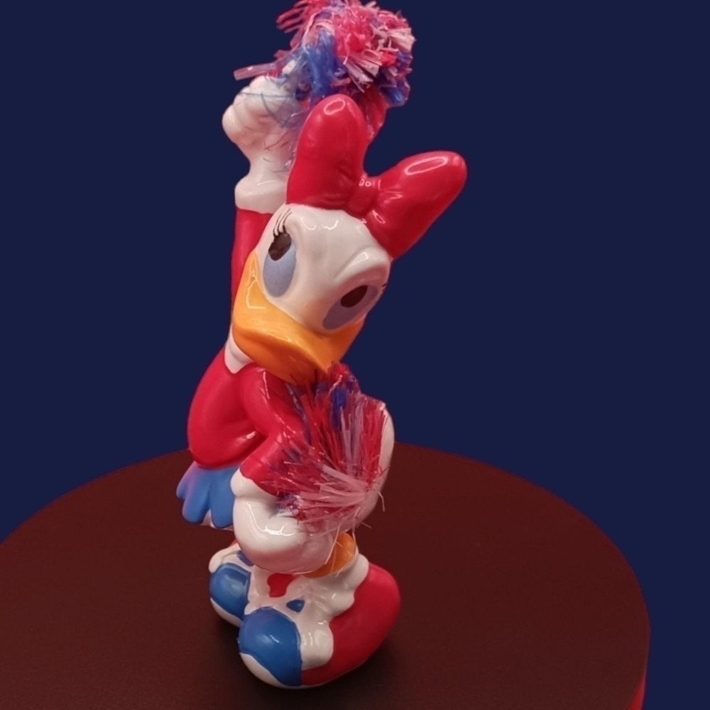 Disney enesco Daisy duck cheerleader figurine